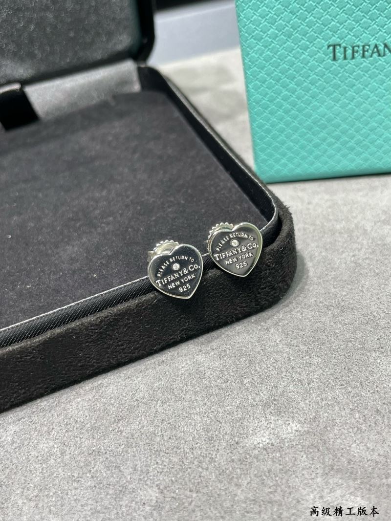 T*f*ny earrings